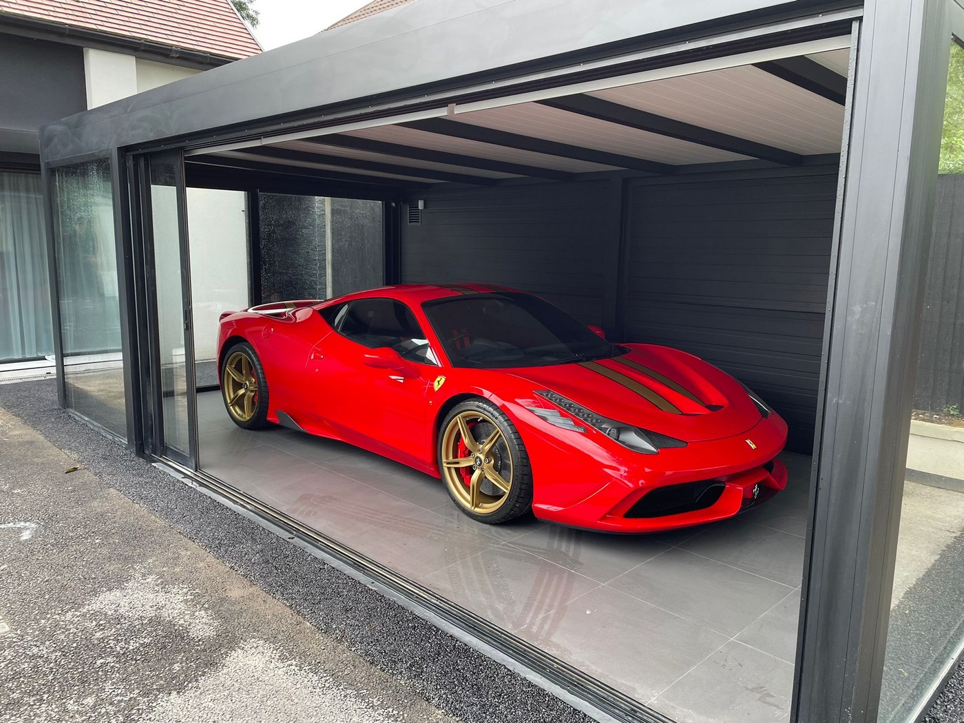 sports car in the garage made of aluminium sliding doors London