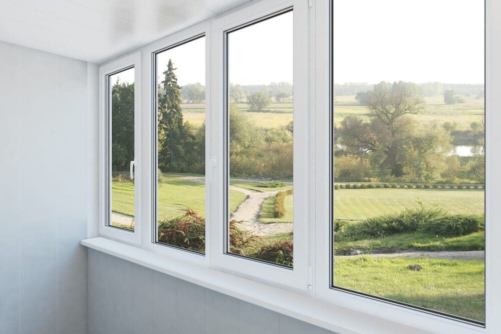 large aluminium sliding window London with a great view on the meadow and river