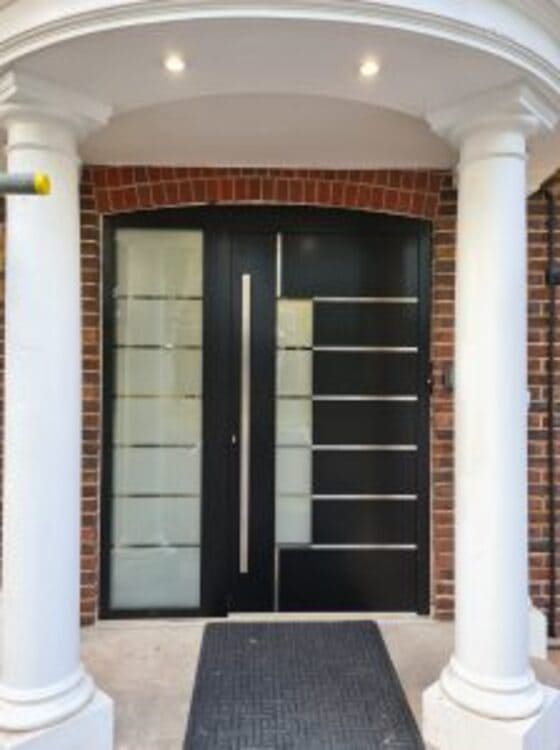 black aluminium front doors London in the luxurious bricked property